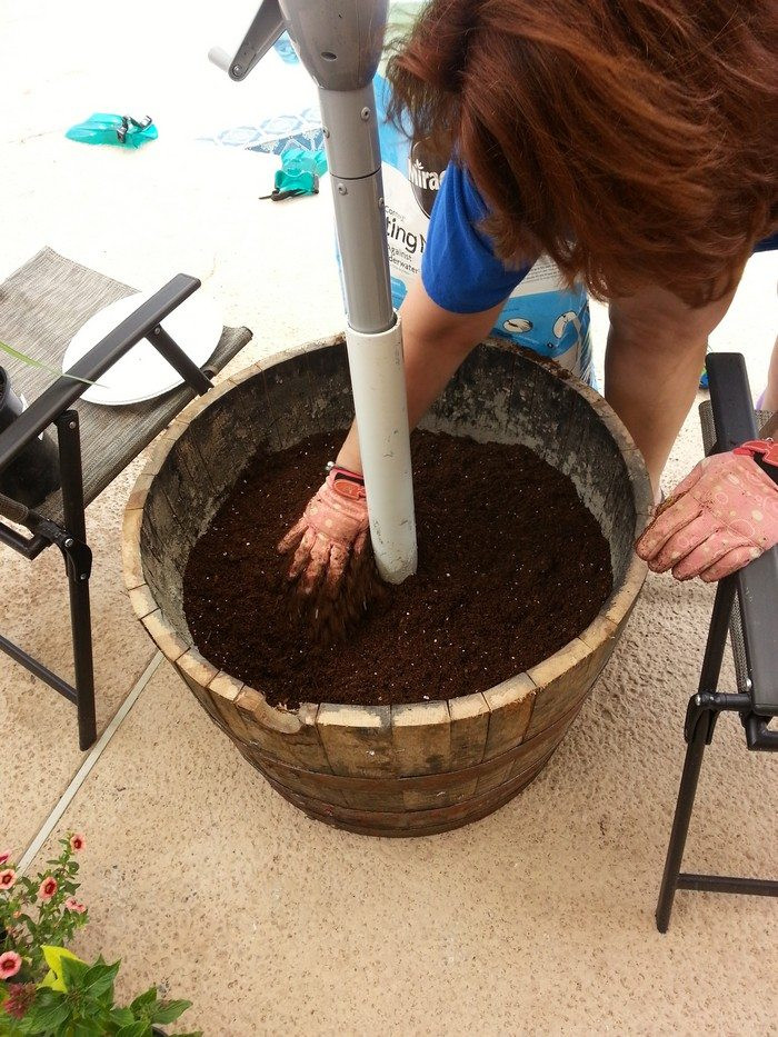DIY Outdoor Umbrella Stand
 How to build a patio umbrella stand planter