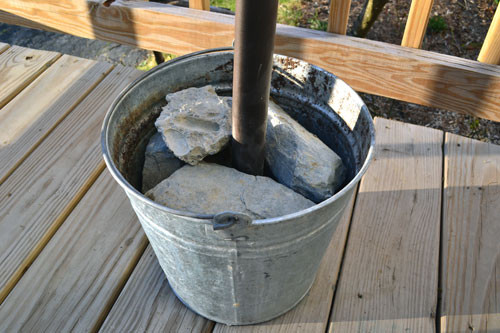 DIY Outdoor Umbrella Stand
 DIY Umbrella Stand Cement Blocks In A Bucket Angie s Roost
