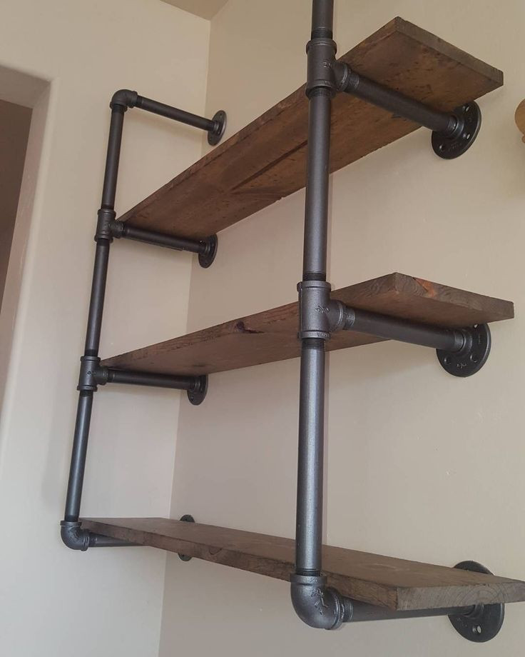 DIY Pipe And Wood Shelves
 Industrial pipe shelving with reclaimed wood This unit