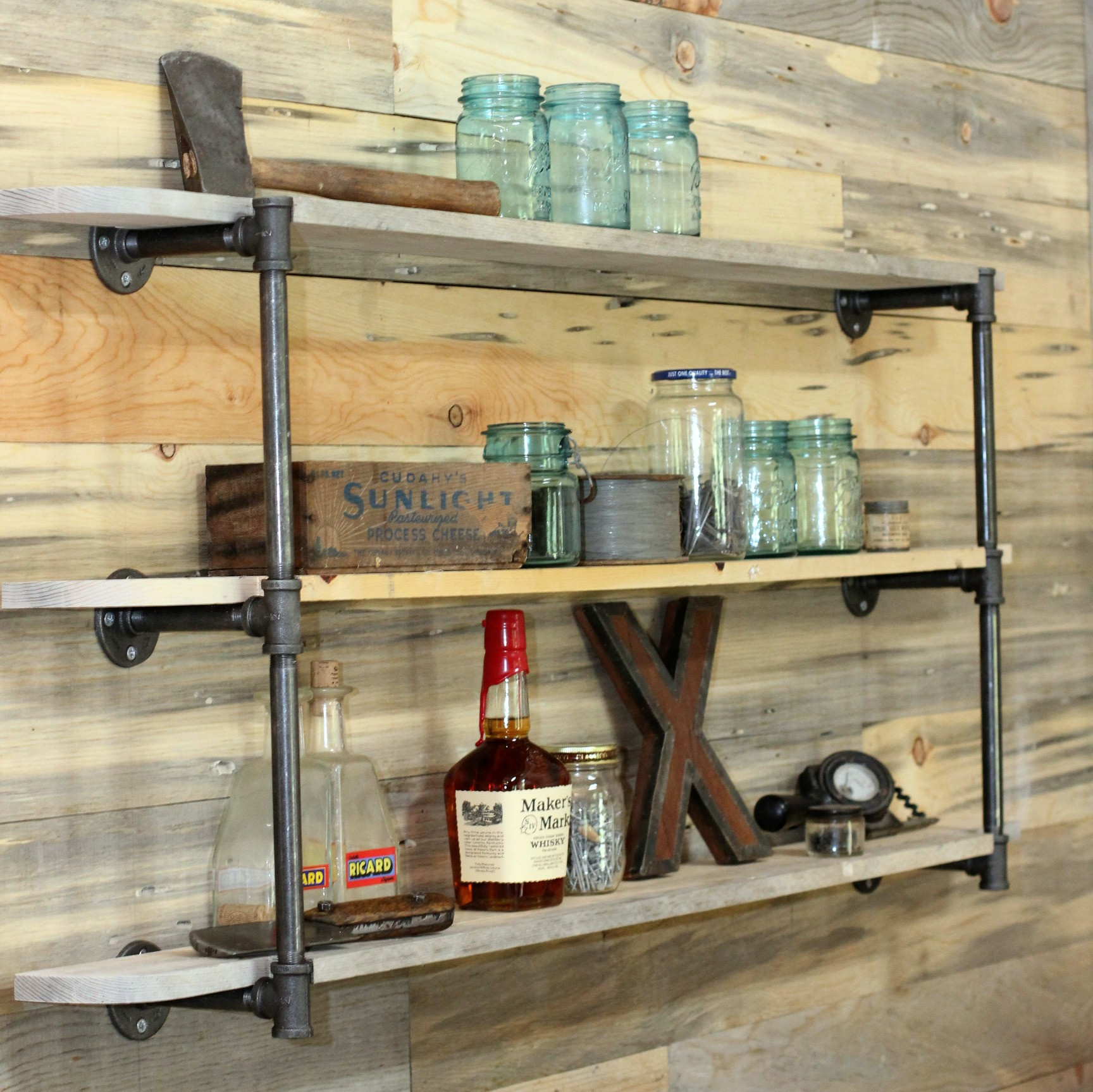 DIY Pipe And Wood Shelves
 DIY Pipe Shelf & Reclaimed Wood Plank Walls