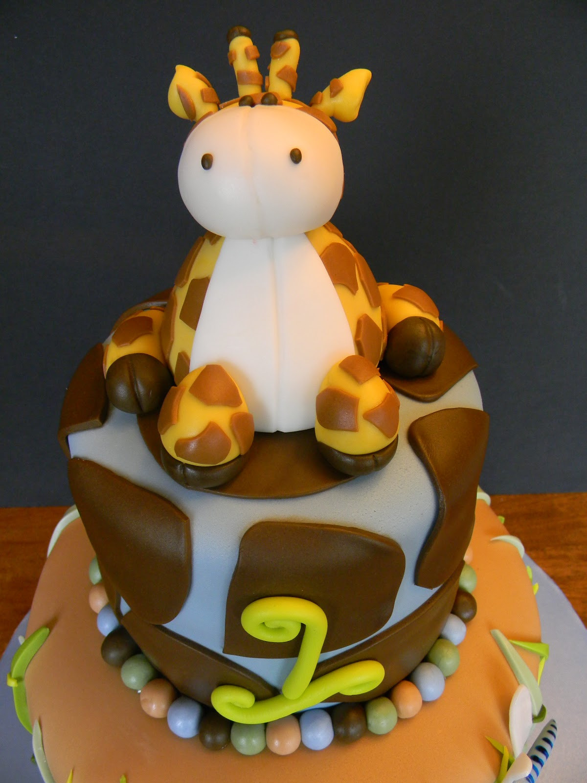 Giraffe Birthday Cake
 Couture Cakes by Angela A Baby Giraffe for Caleb s 1st