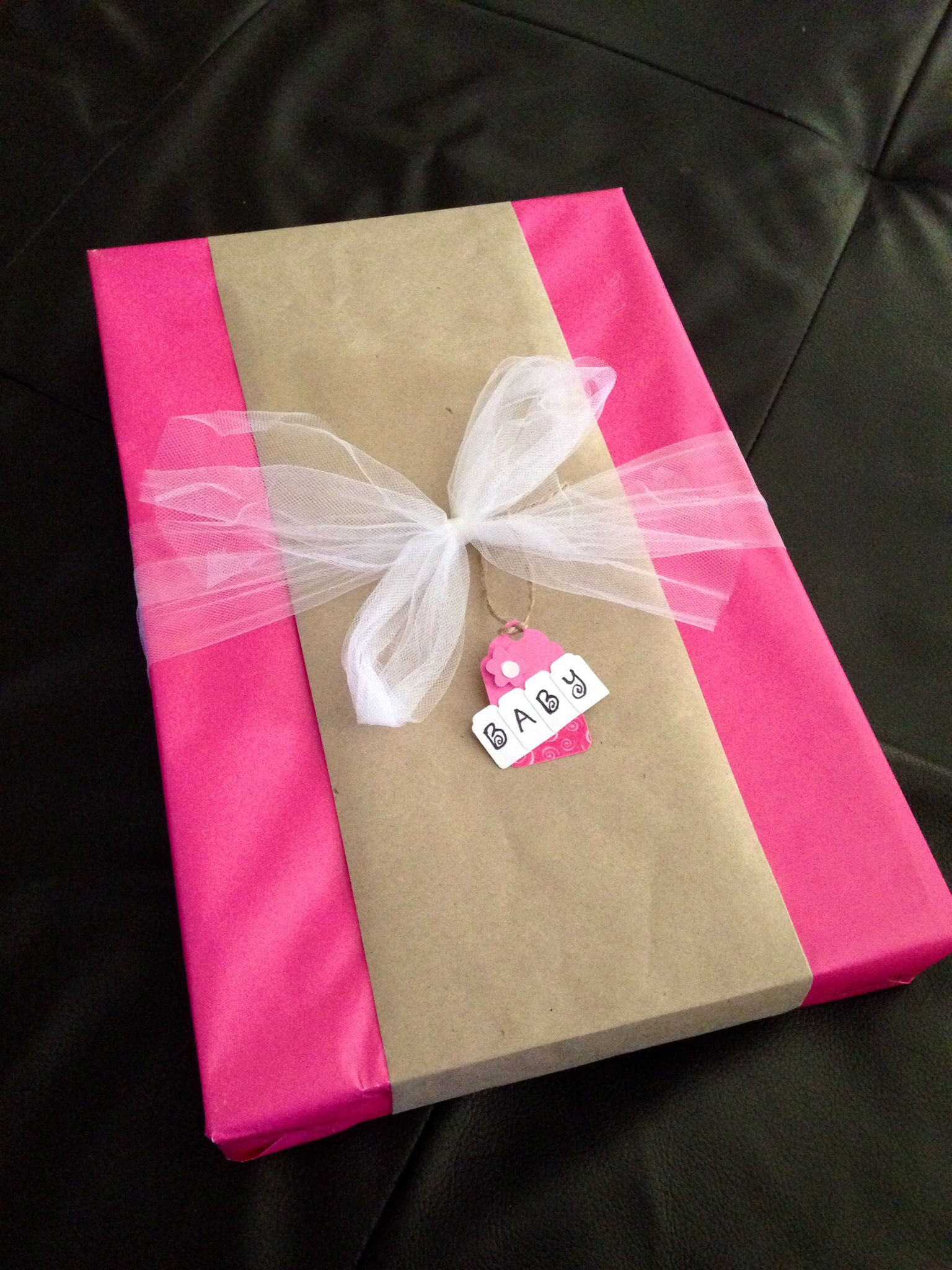 How To Wrap A Baby Gift Without Wrapping Paper
 DIY baby shower t wrap idea Solid pink wrapping paper