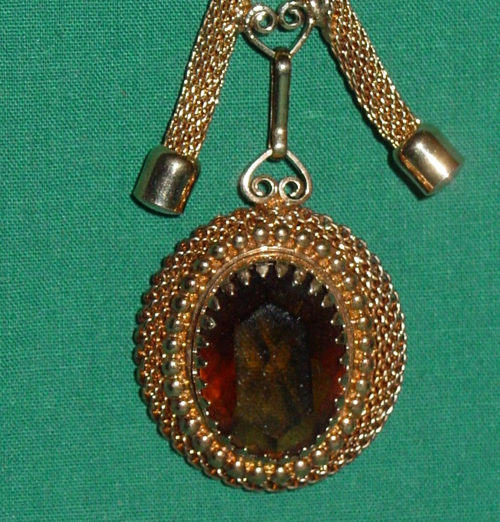 Sarah Coventry Necklace
 Vintage Sarah Coventry Necklace Faceted Amber Glass Stone