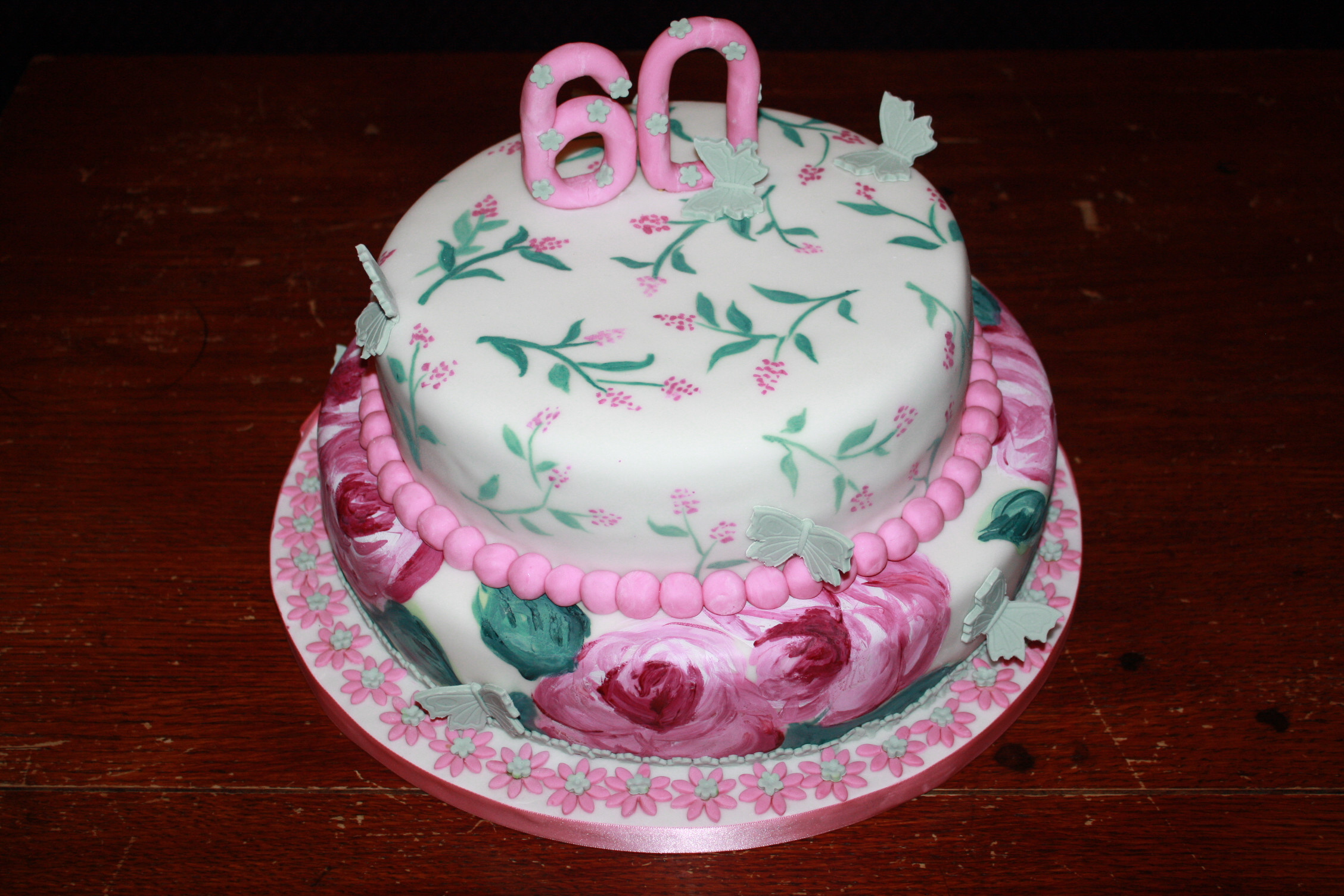 60th Birthday Cakes For Her
 Have your cake and eat it Hand painted tiered cake for a