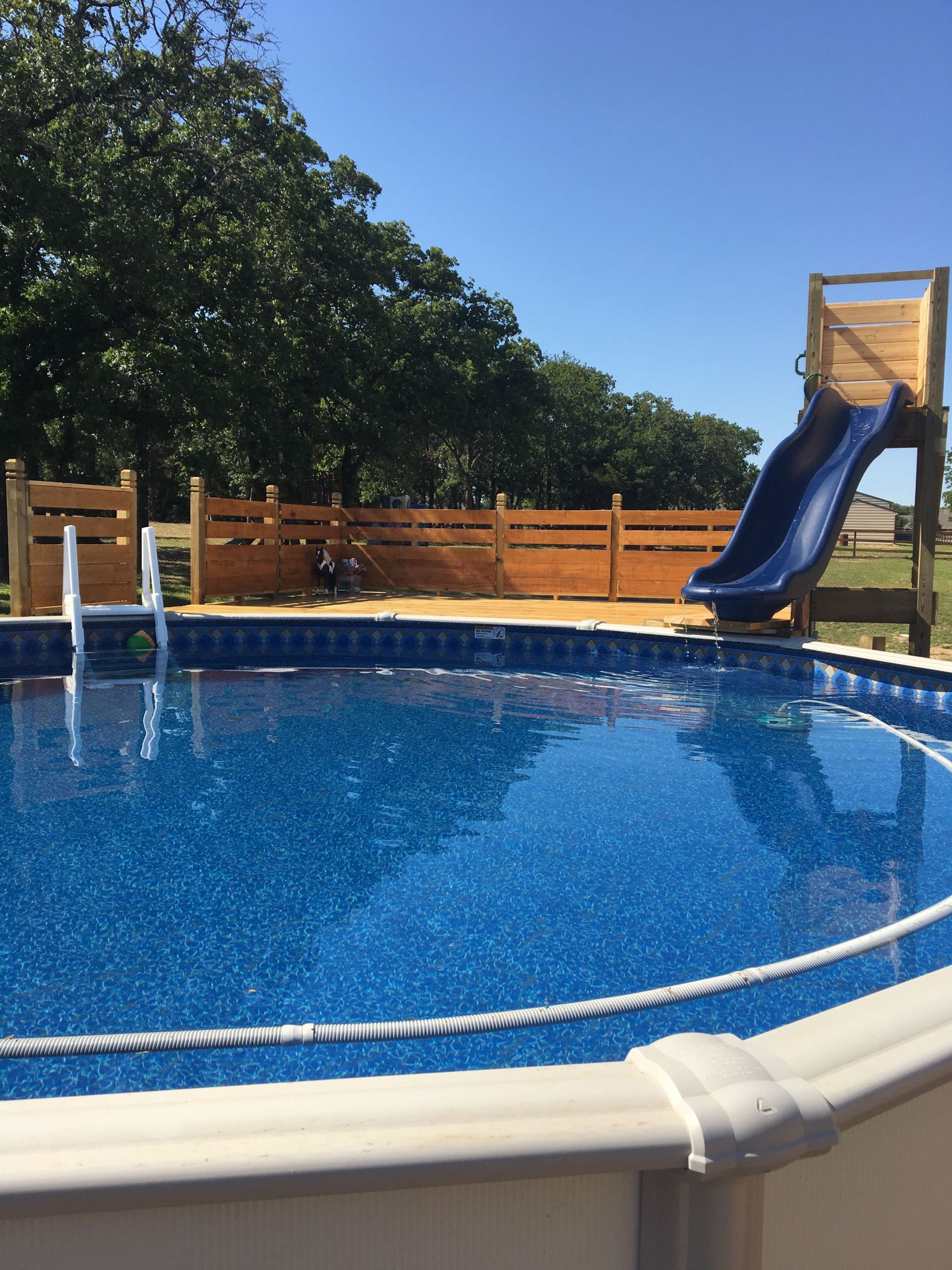 Above Ground Pool Slide
 Beachy Pool deck with slide