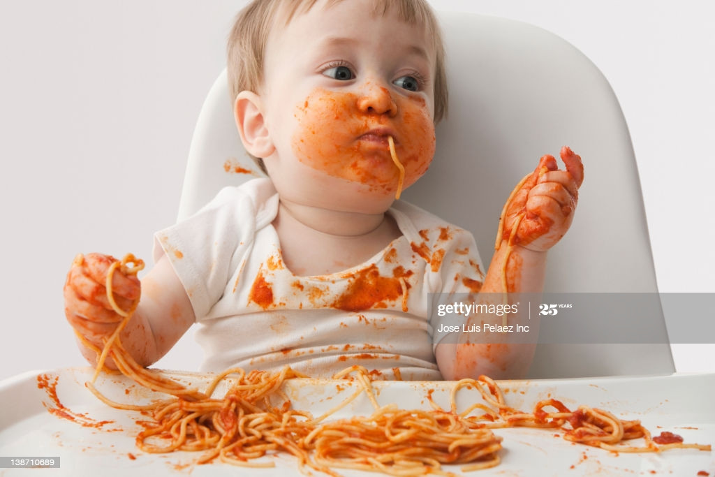 Baby Eating Spaghetti
 Mixed Race Baby Boy Eating Spaghetti Stock Getty