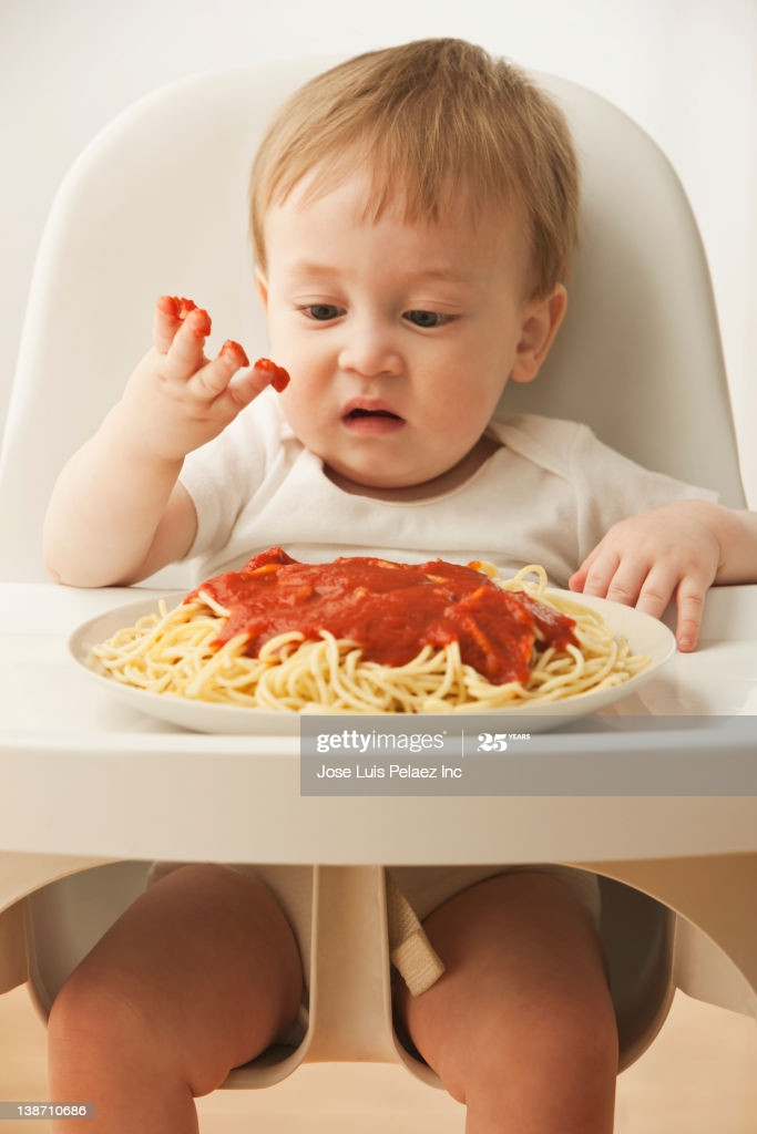 Baby Eating Spaghetti
 Mixed Race Baby Boy Eating Spaghetti Stock Getty