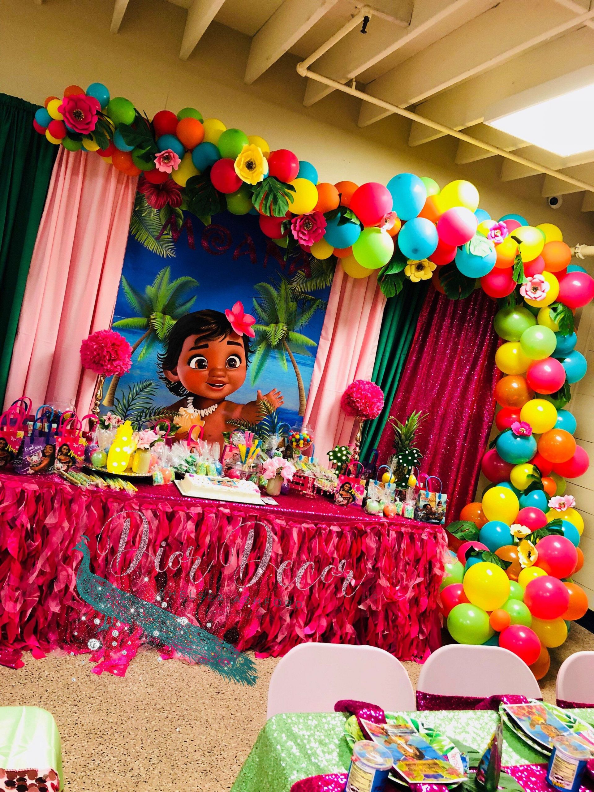 Baby Moana Party Decorations
 Moana themed balloon garland with paper flowers by