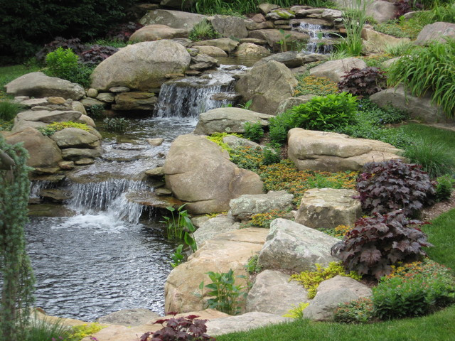 Backyard Ponds And Waterfalls
 Waterfall and garden pond Traditional Landscape