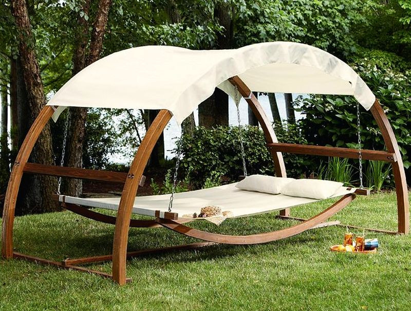 Backyard Swing Bed
 Swing bed with canopy turns ordinary garden into sumptuous
