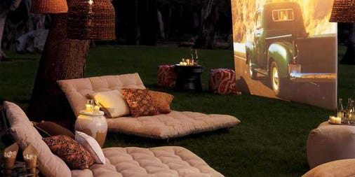 Backyard Theater Ideas
 This mini LED projector will turn your backyard into an