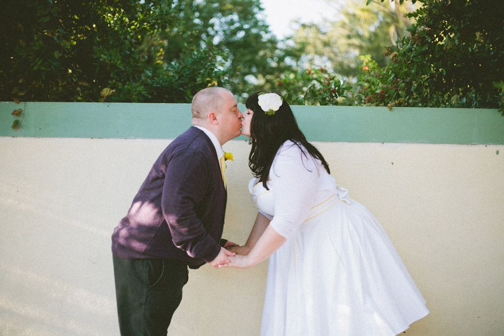 Backyard Wedding Cast
 Sweet Backyard Elopement Nicole & Tom wall kiss