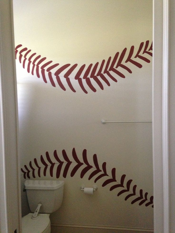 Baseball Bathroom Decor
 Baseball laces I painted on the wall in the bathroom for