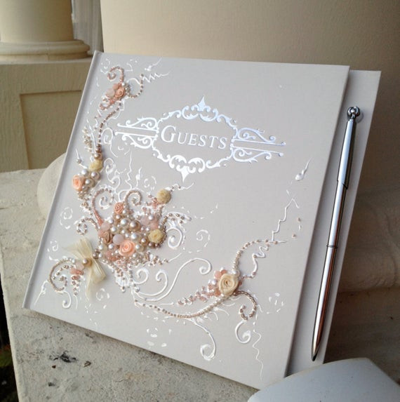 Beautiful Wedding Guest Books
 Items similar to Beautiful Wedding guest book in peach