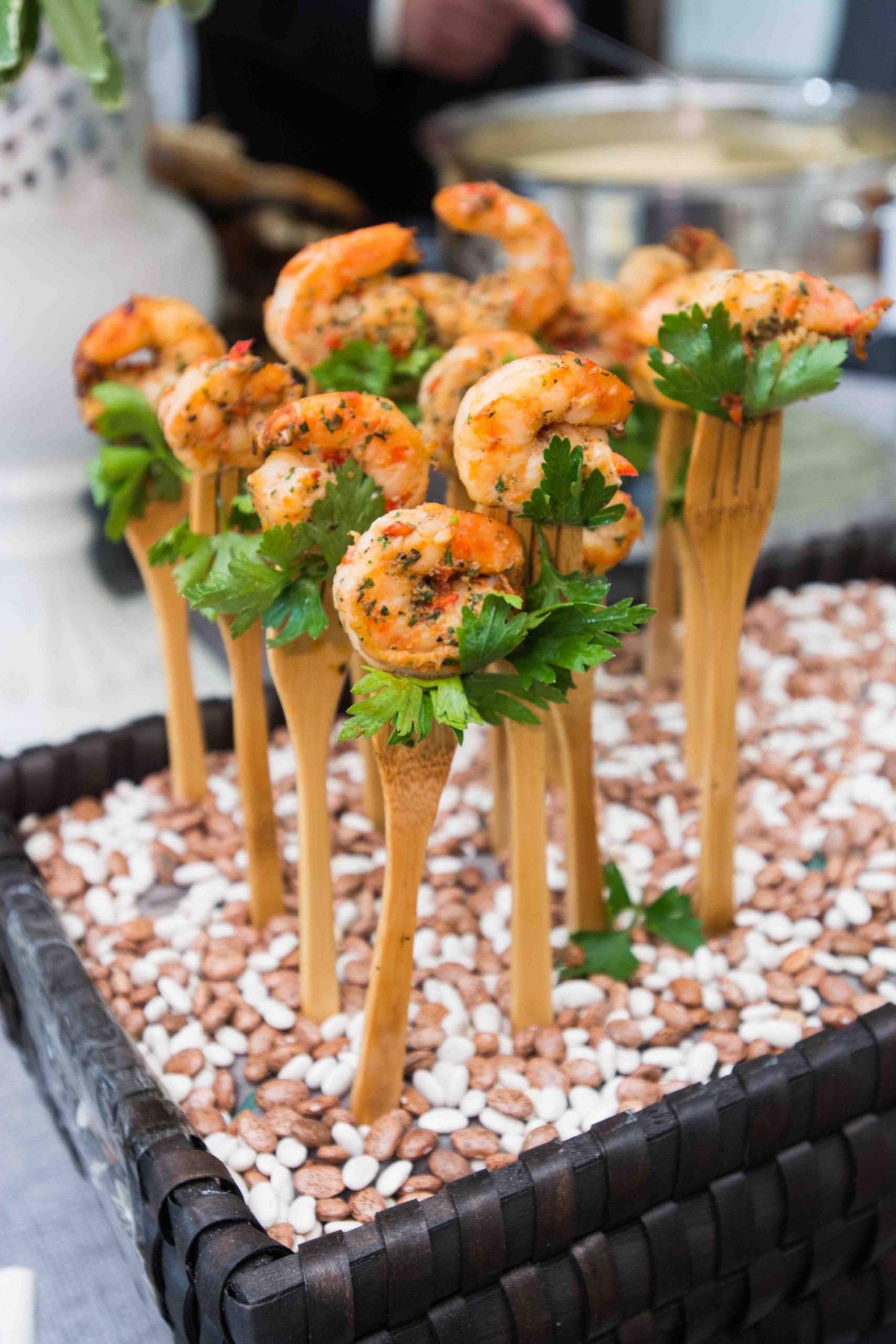 Best Seafood Appetizer
 Wooden forks were displayed upright on a bed of beans and