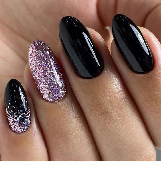 Black Nails With Glitter
 Black nails and purple glitter