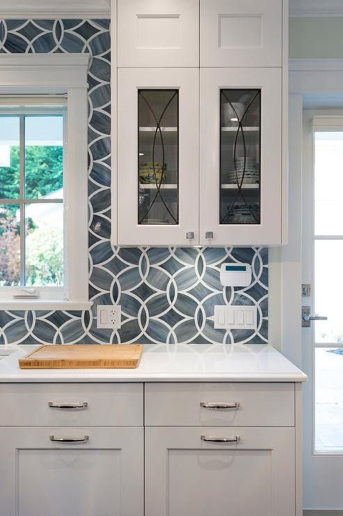 Blue Tile Backsplash Kitchen
 Blue Kitchen Tile backsplash with Glass Eclipse Cabinets