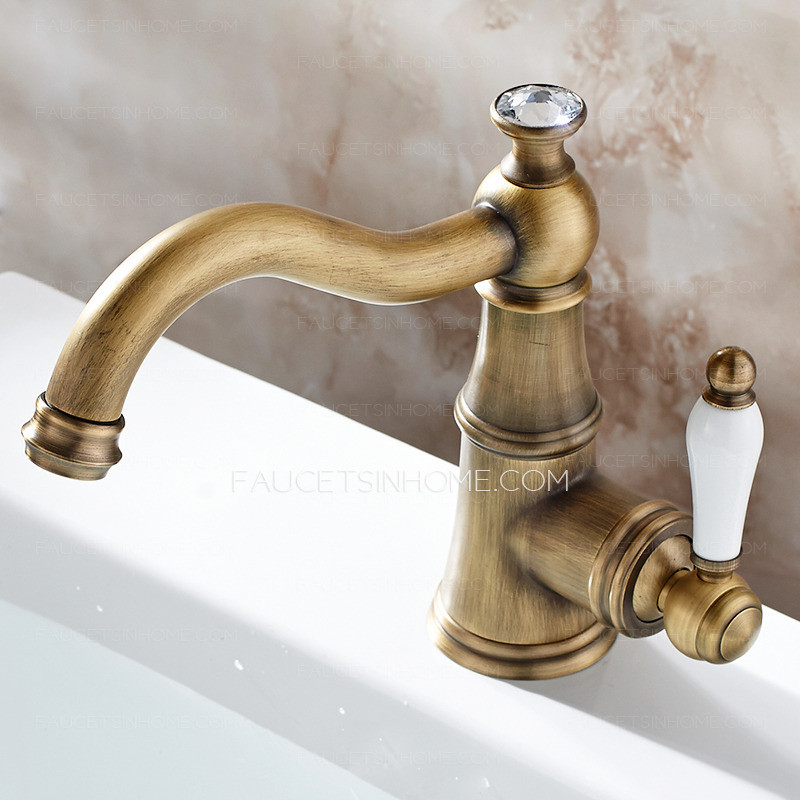 Brass Faucets Bathroom
 Single Hole Antique Brass Porcelain Handle Bathroom Faucets