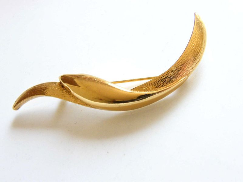 Brooches Simple
 Vintage Monet Simple Curved Bar Style Brooch in Gold Tone