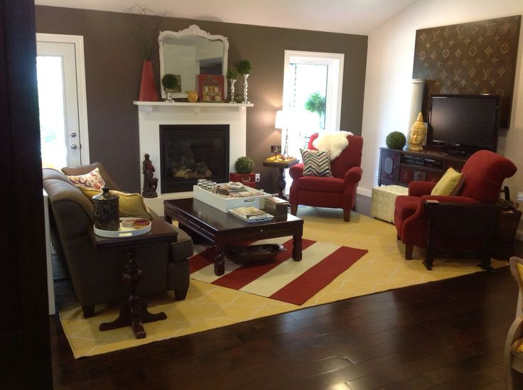 Brown Accent Walls Living Room
 Brown accent wall w red curtains