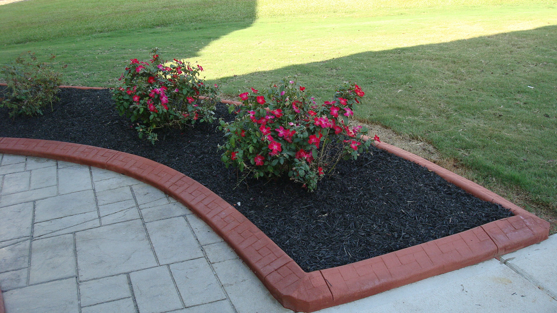 Cement Landscape Edging
 Poured concrete landscape edging houses landscaping