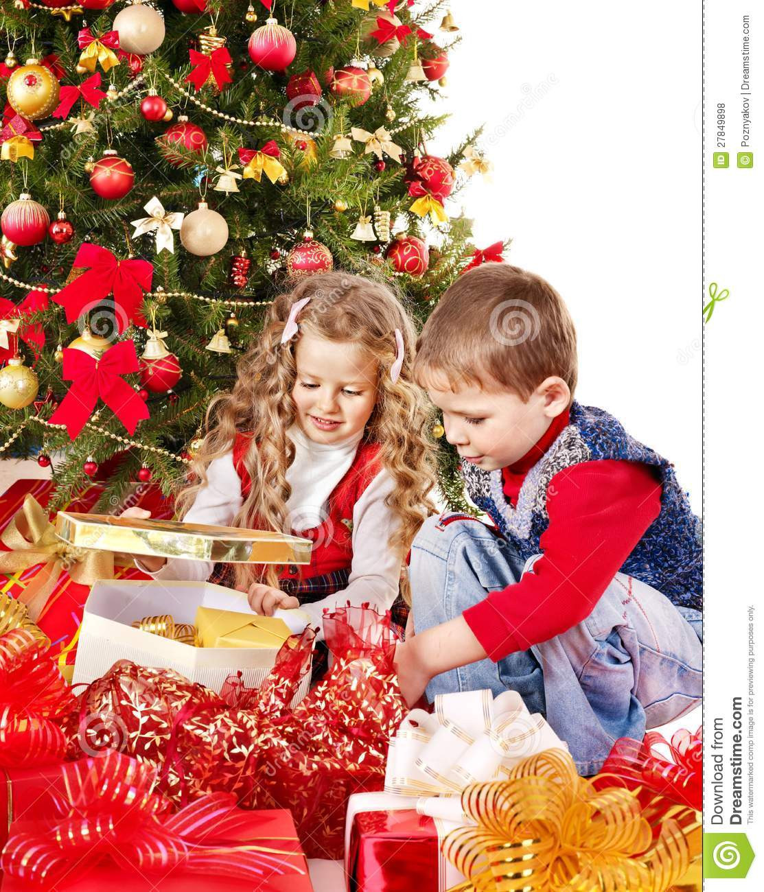 Children Are Gifts
 Children With Gift Box Near Christmas Tree Royalty Free