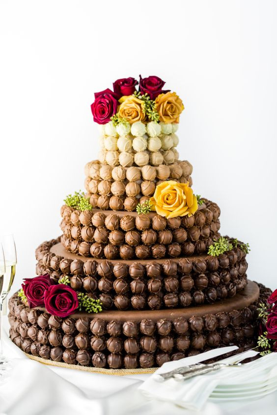 Chocolate Tower Truffle Cake
 Chocolate truffle tower tiered wedding cake with assorted