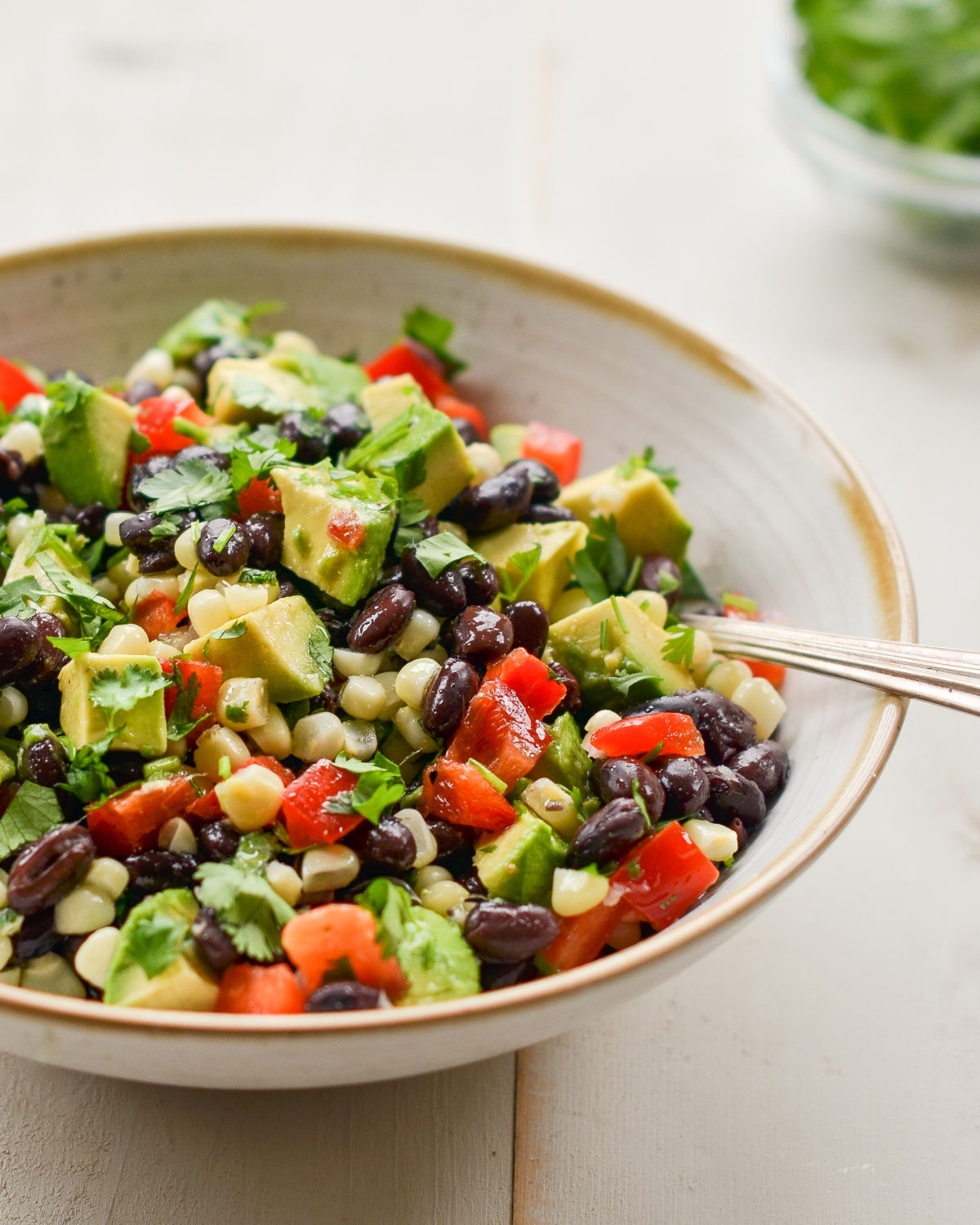 Corn Bean Salad
 Black Bean Salad with Corn Avocado & Lime Vinaigrette