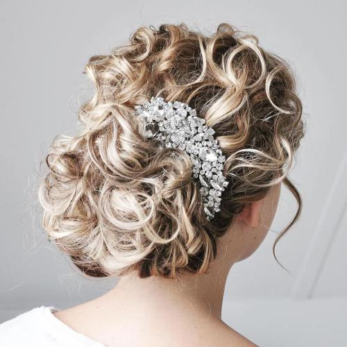 Curly Updo Wedding Hairstyles
 20 Soft and Sweet Wedding Hairstyles for Curly Hair 2020