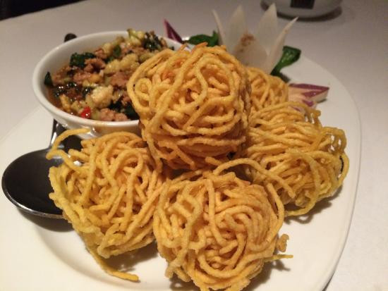 Deep Fried Noodles
 deep fried crispy noodles topped with minced pork & balsam