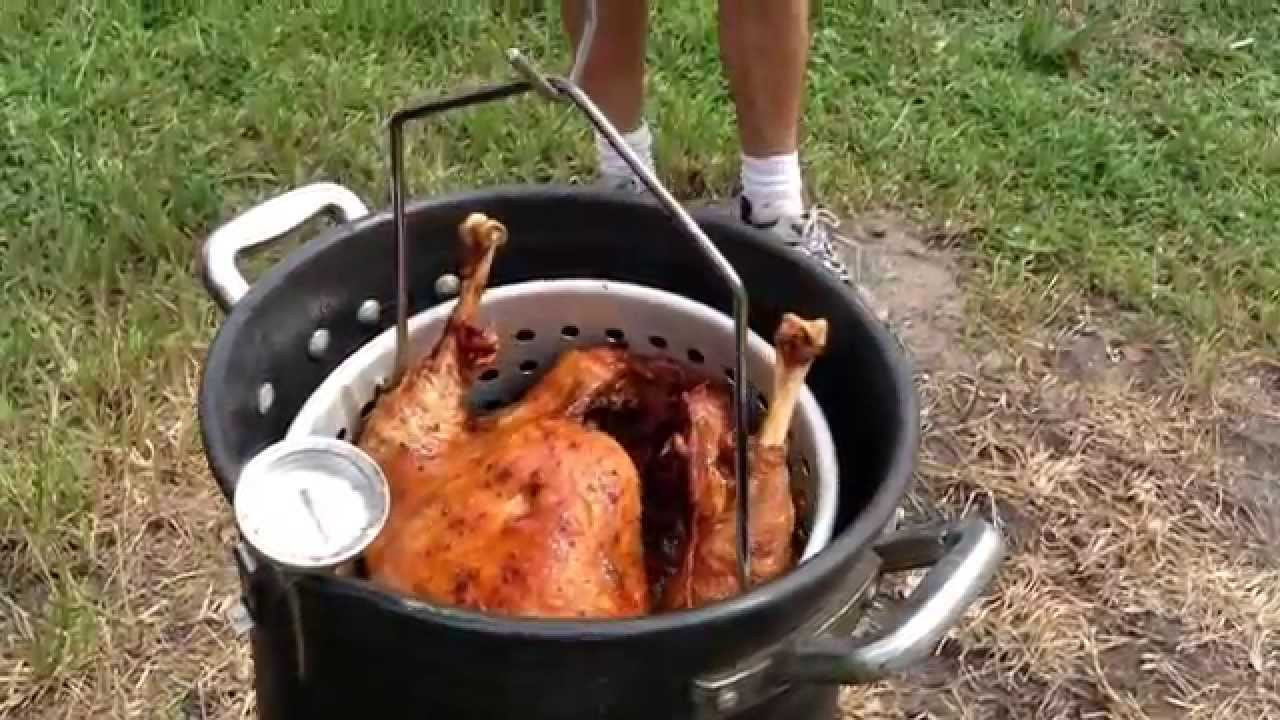 Deep Fried Whole Turkey
 Deep Frying a Whole Turkey Fried in Peanut Oil at 300°F