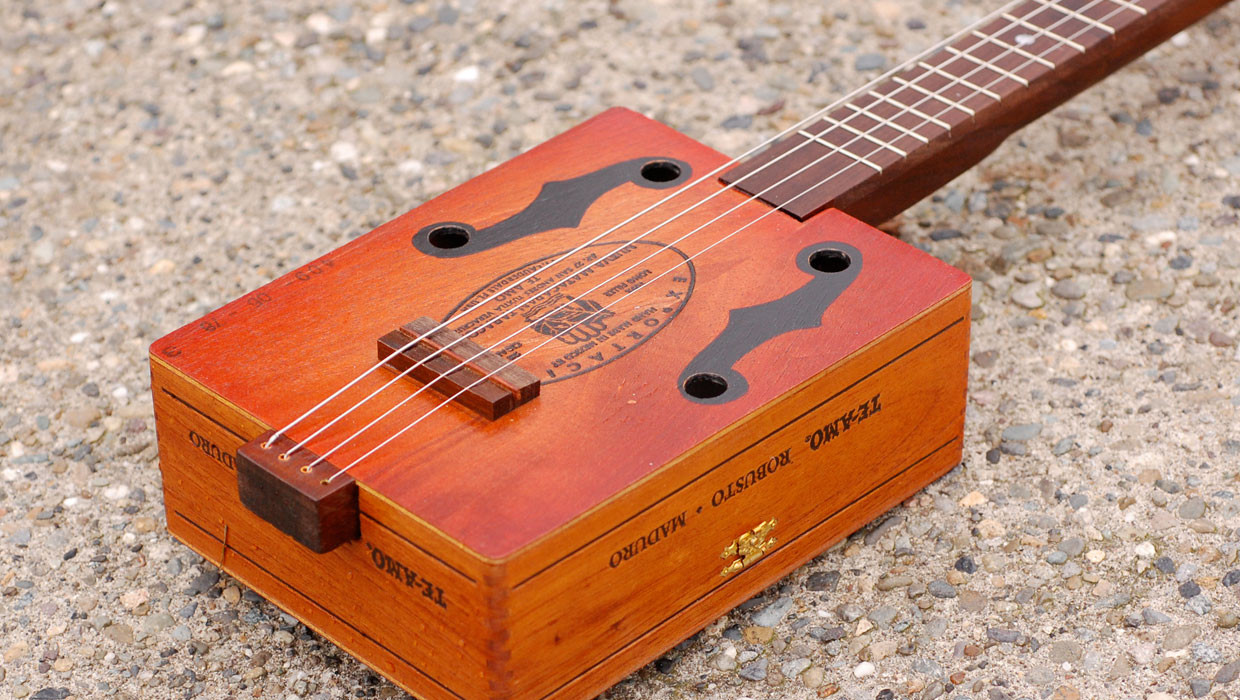 DIY Cigar Box Guitar
 Family Fun How to Make a Guitar Out of a Cigar Box