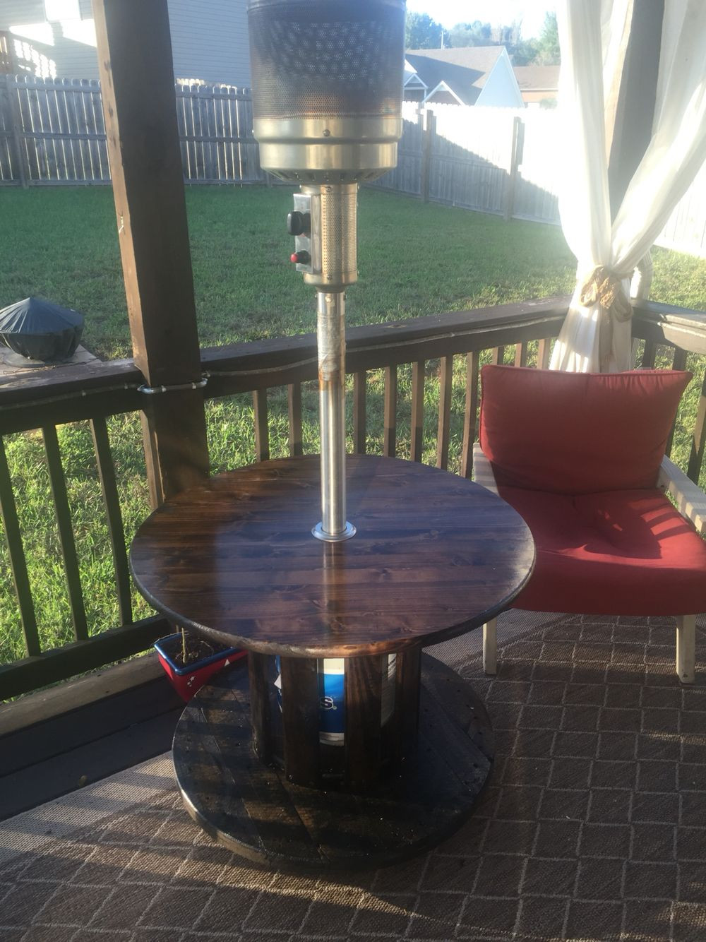 DIY Outdoor Heater
 Reclaimed spool and propane heater= table heater