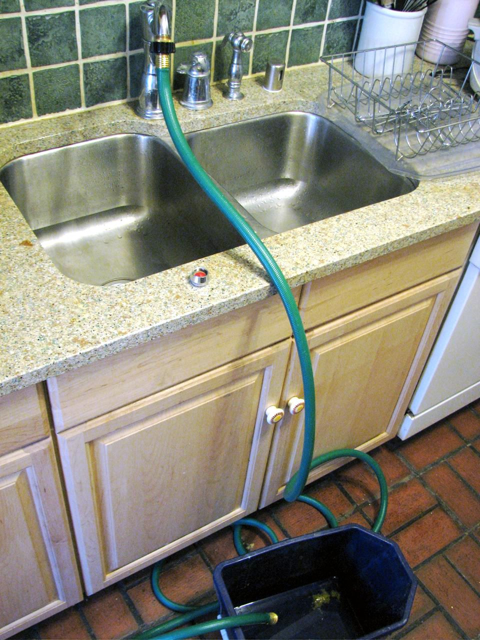 DIY Outdoor Sink Powered By A Water Hose
 Attach a Garden Hose to a Kitchen Faucet