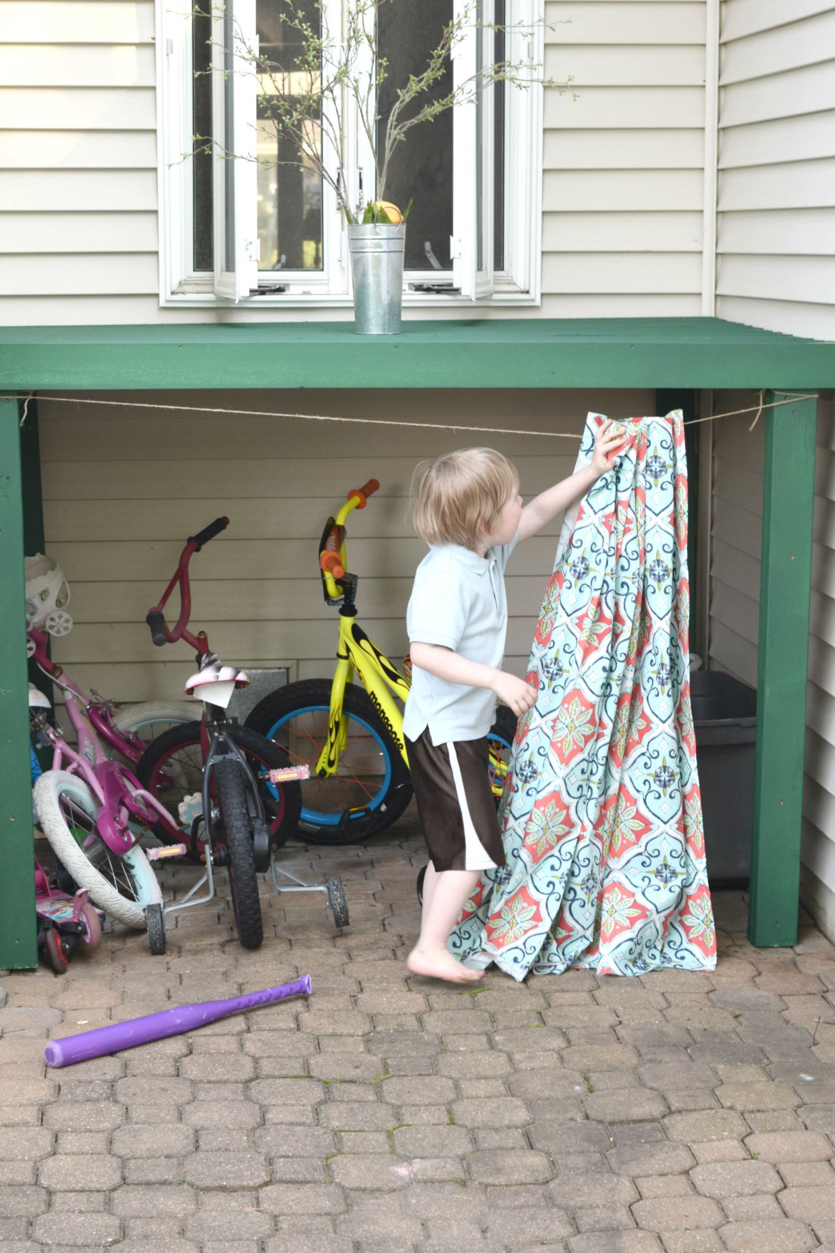 DIY Outdoor Toy Storage
 How to hide kids outdoor toys a DIY storage solution