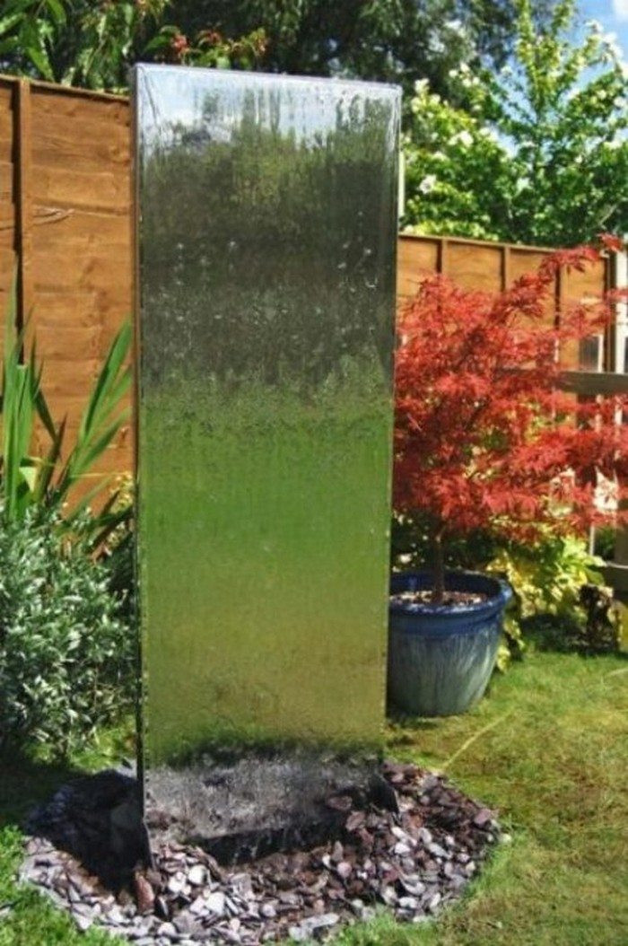 DIY Outdoor Water Wall
 How to build a glass waterfall for your backyard