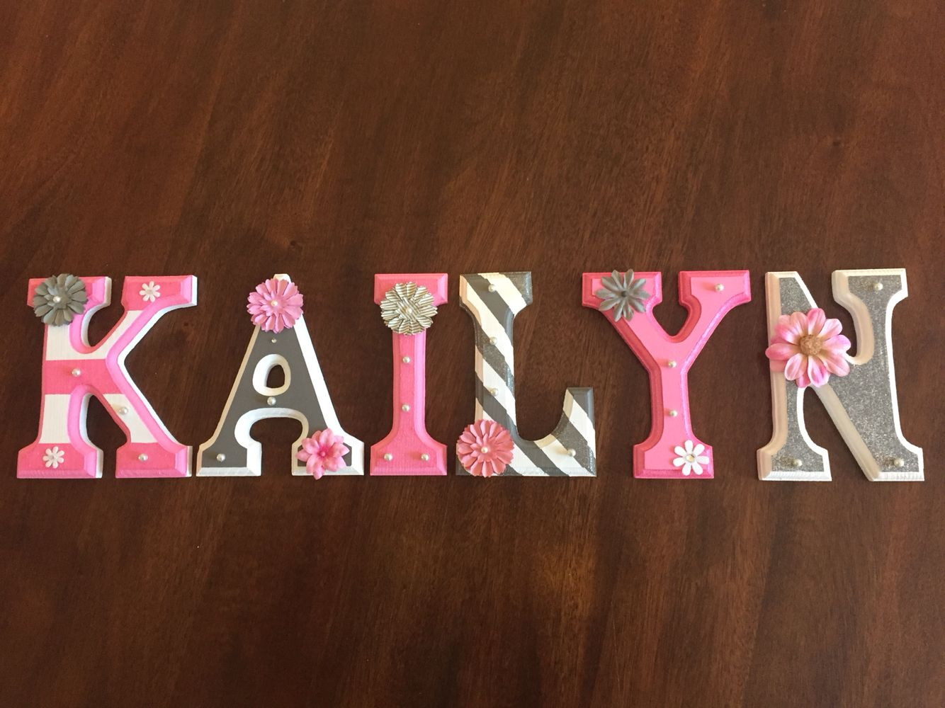 DIY Painted Wooden Letters
 Letters painted for our baby girl Love DIY projects