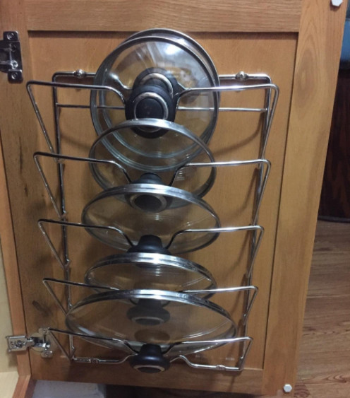 DIY Pot Lid Organizer
 Mount a pot lid rack to your cabinet doors