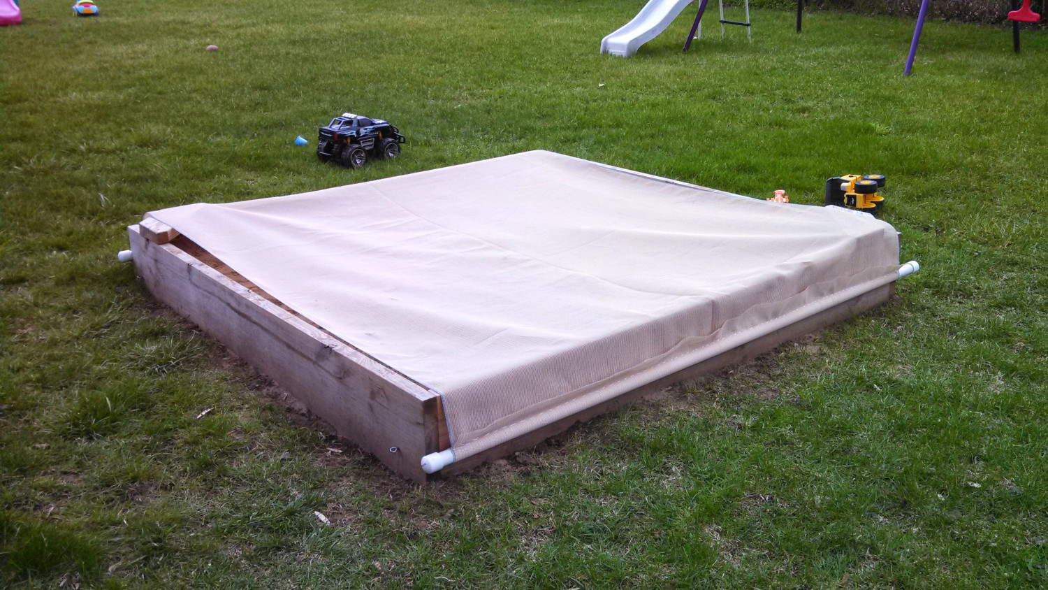 DIY Sandbox Cover
 DIY Cover Stops Cats From Treating My Kid’s Sandbox Like A