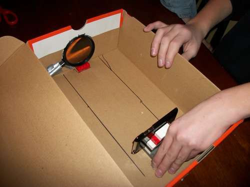 DIY Shoebox Projector
 Homemade iPhone Projector Puts Shoeboxes To Good Use