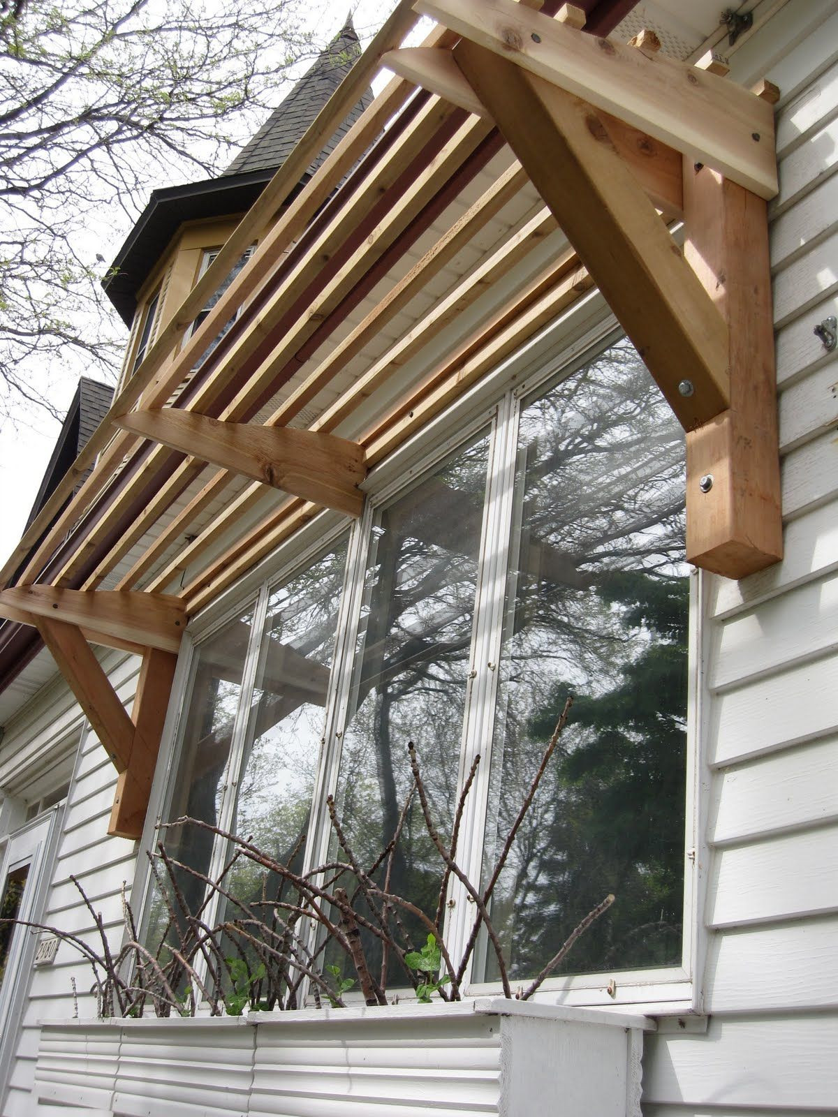 DIY Wood Awning
 Horizontal Slat Awning all wood