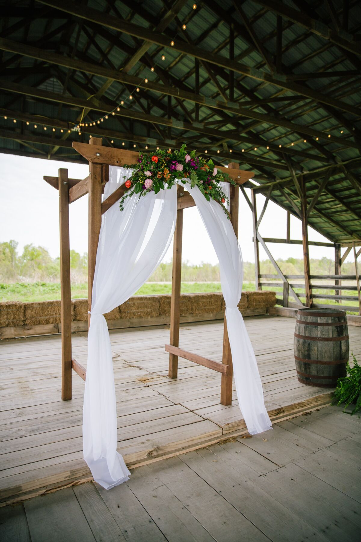 DIY Wooden Arch
 DIY Wooden Wedding Arch With Colorful Flowers