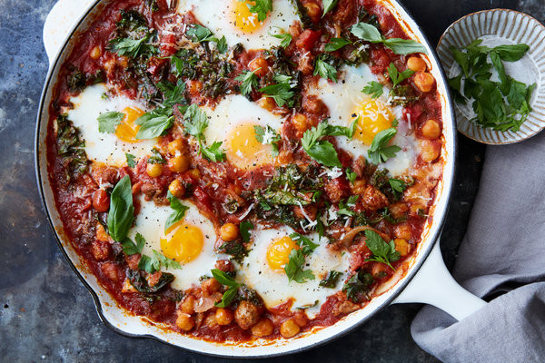 Eggs And Beans Breakfast
 Baked Eggs With Beans and Greens Recipe NYT Cooking