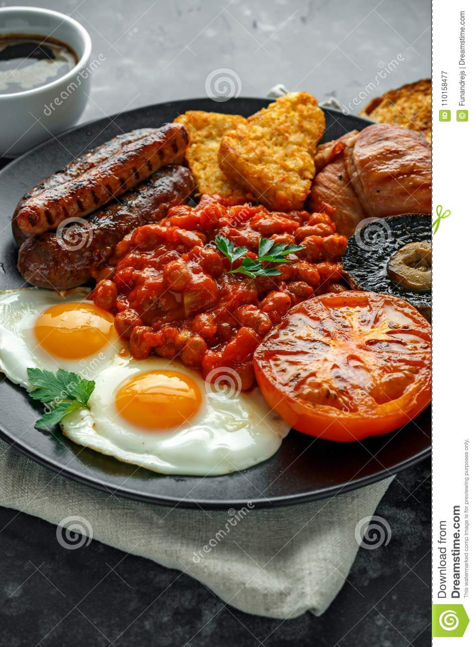 Eggs And Beans Breakfast
 Full English Breakfast With Bacon Sausage Fried Egg