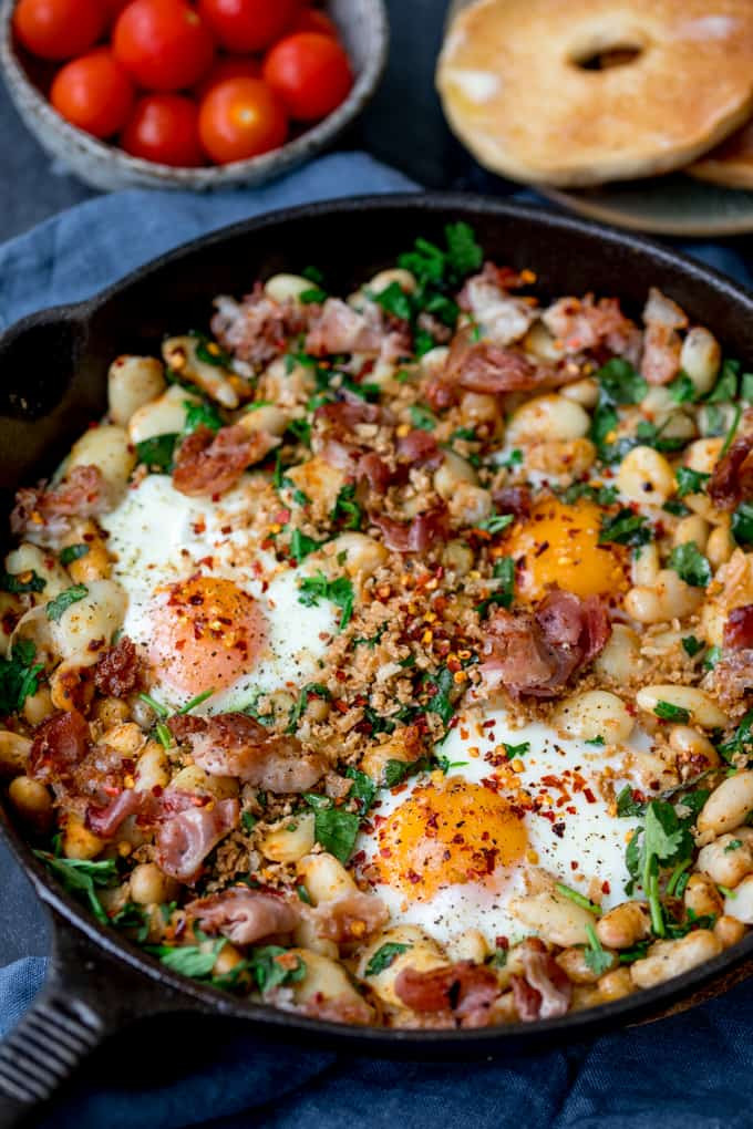 Eggs And Beans Breakfast
 Spicy Egg Breakfast with Smashed Beans and Pancetta