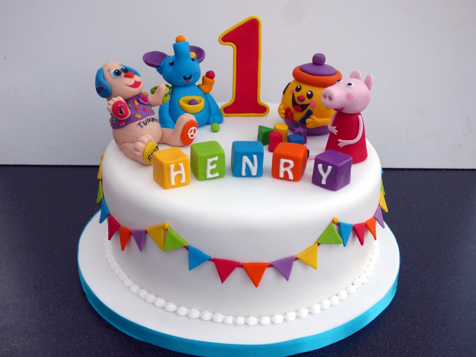 First Birthday Cakes
 1st Birthday cake with Favourite Toys Susie s Cakes