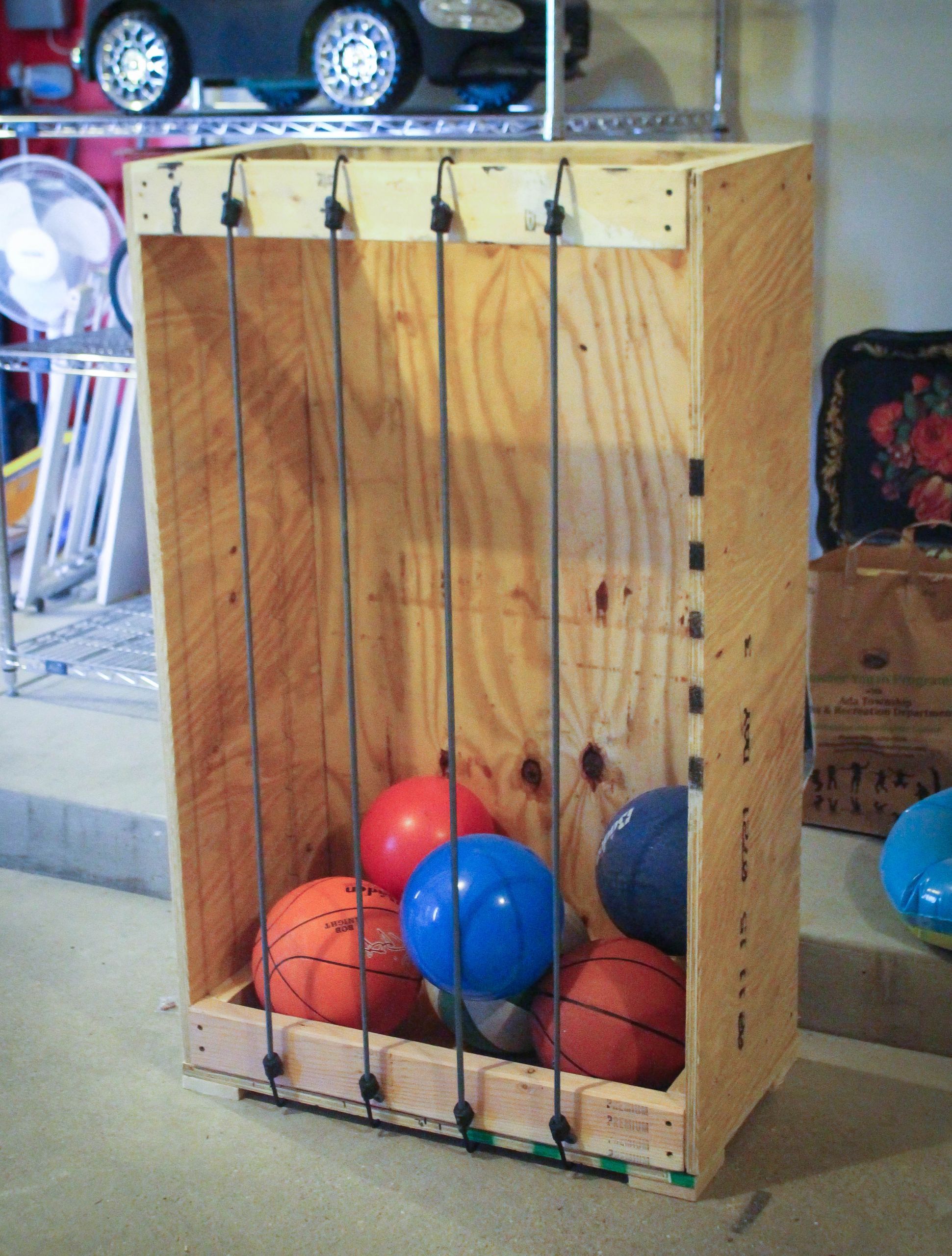 Garage Ball Organizer
 Bungee Ball Storage