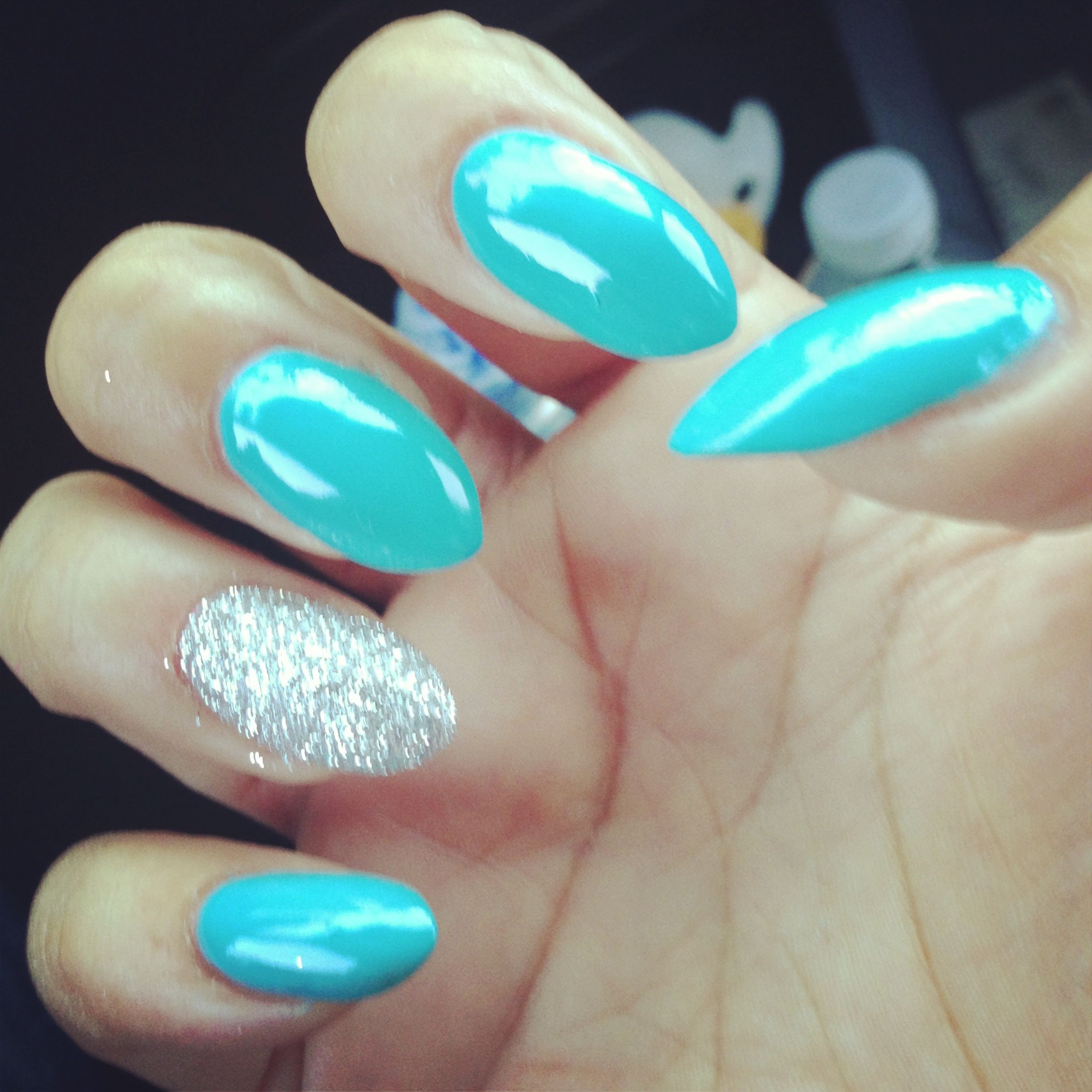 Glitter Almond Nails
 Turquoise and accent glitter almond nails