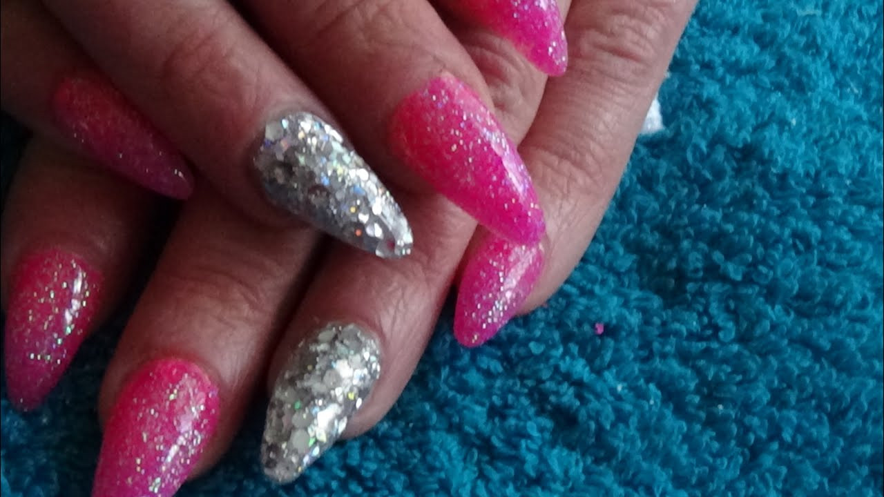 Glitter Pink Nails
 neon hot pink & silver glitter acrylic nails