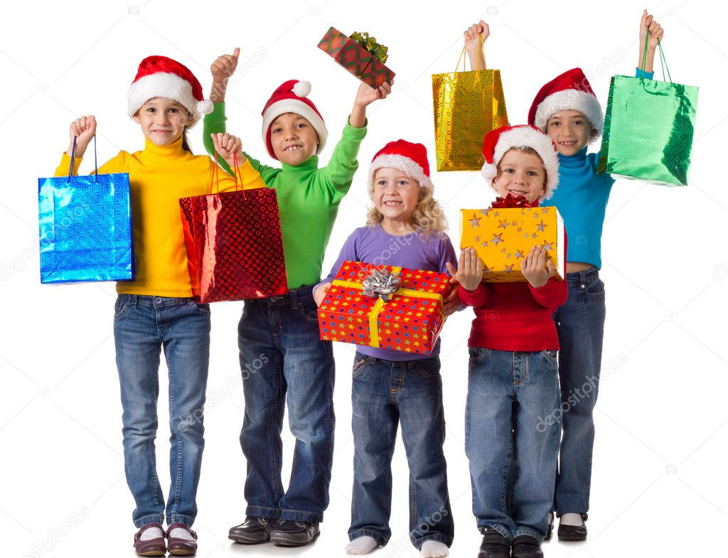 Group Gifts For Kids
 Group of happy kids with christmas ts — Stock